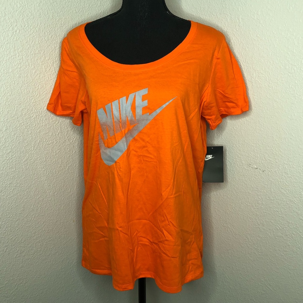 Nike bright orange t-shirt.